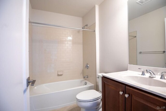 bathroom with toilet, visible vents, shower / washtub combination, and vanity