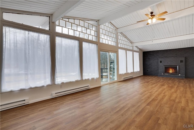 unfurnished living room featuring ceiling fan, a fireplace, baseboard heating, and wood finished floors