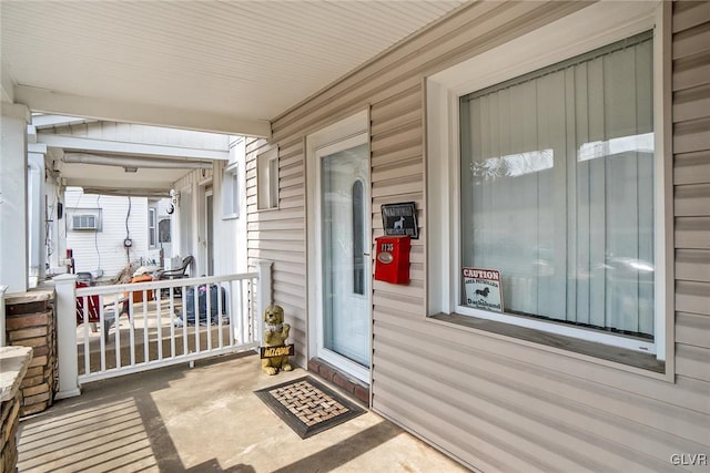 doorway to property with a porch