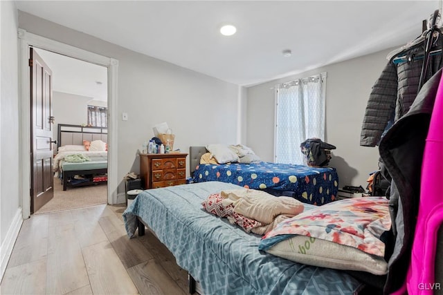 bedroom featuring wood finished floors