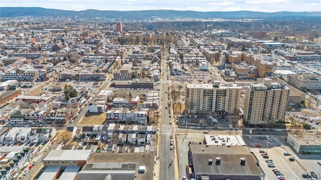 bird's eye view with a view of city and a mountain view