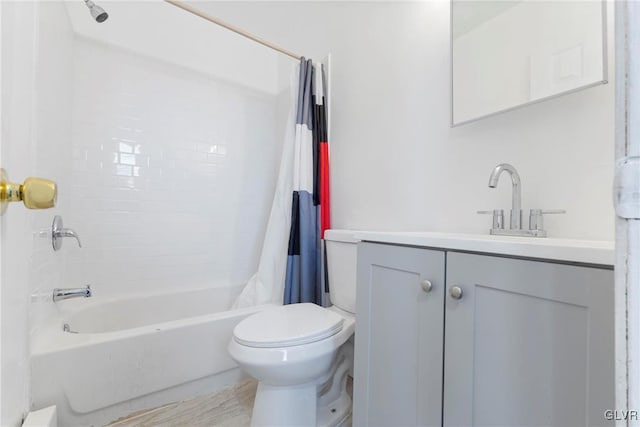 full bathroom with toilet, shower / bathtub combination with curtain, and vanity