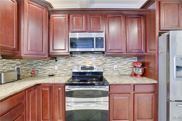 kitchen with decorative backsplash, stainless steel appliances, and dark brown cabinets