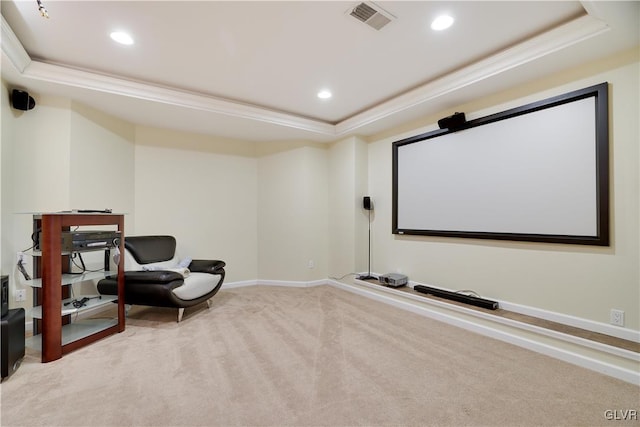 cinema room featuring recessed lighting, visible vents, carpet, a raised ceiling, and crown molding