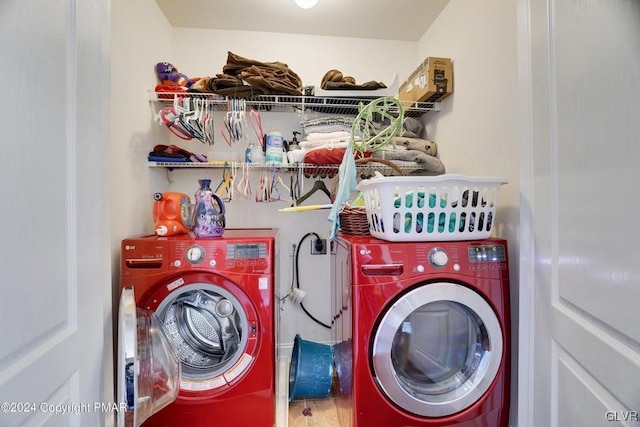 laundry area with laundry area and independent washer and dryer