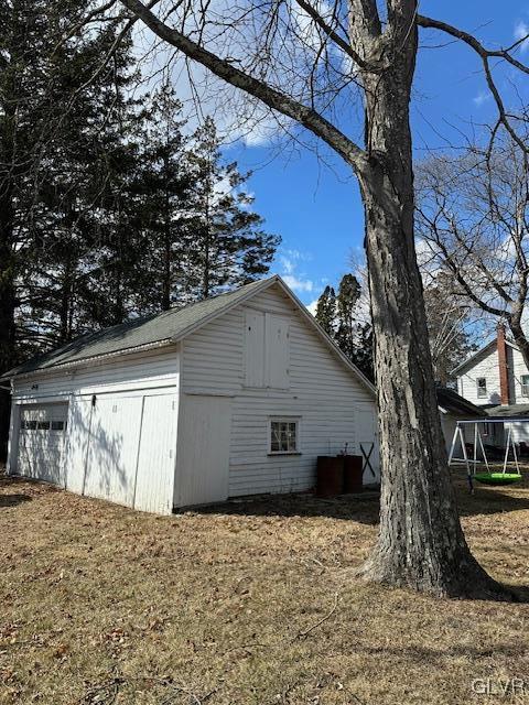 exterior space with an outbuilding