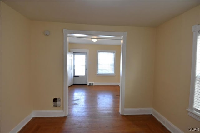 interior space with visible vents and baseboards