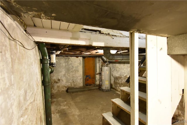 unfinished basement with gas water heater