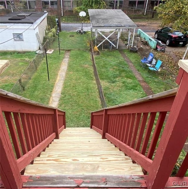 exterior space with a yard and an outbuilding