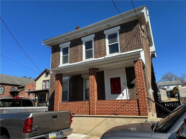 view of front of home with brick siding