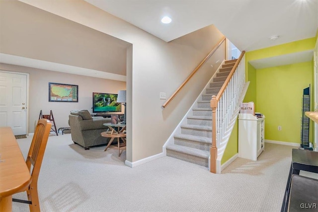 stairs with baseboards, carpet flooring, and recessed lighting