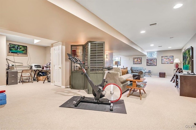 exercise area featuring baseboards, carpet flooring, visible vents, and recessed lighting