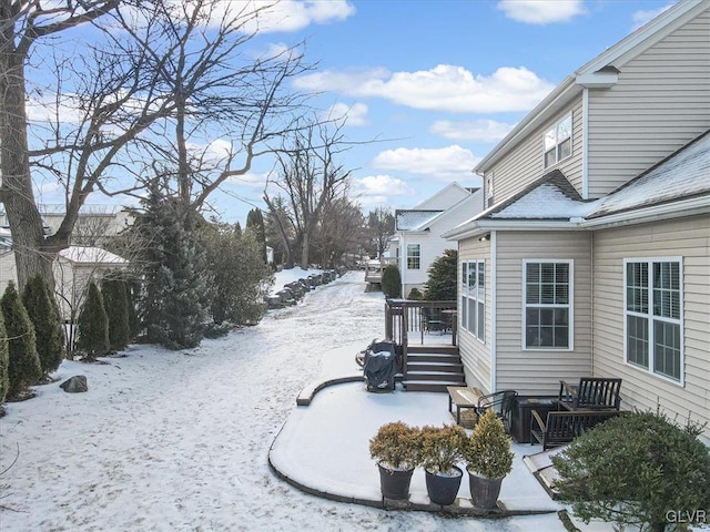 view of yard covered in snow