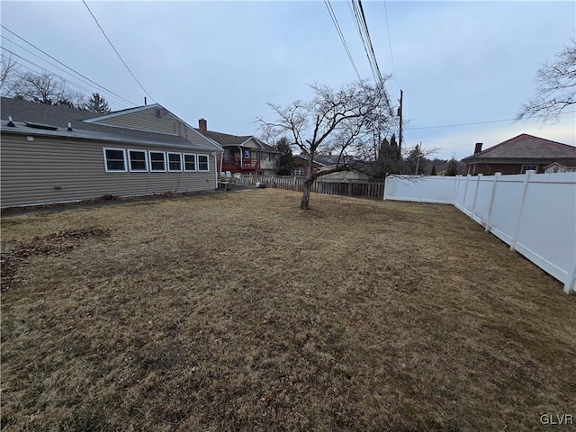 view of yard featuring a fenced backyard