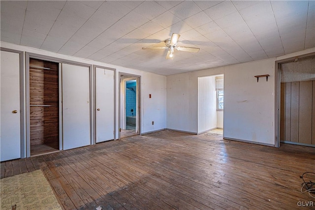 unfurnished bedroom with hardwood / wood-style floors and a ceiling fan