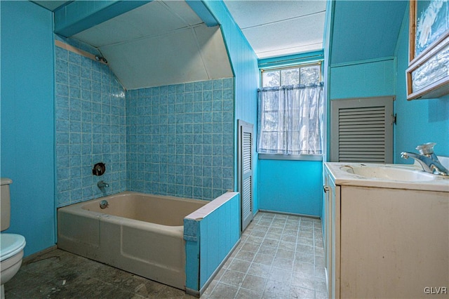 full bathroom featuring shower / bath combination, toilet, vanity, and vaulted ceiling