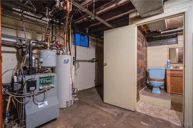 utility room featuring water heater and a heating unit