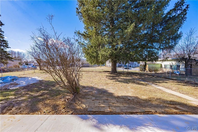 view of yard with fence