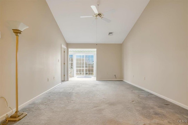 unfurnished room featuring visible vents, carpet floors, baseboards, and a ceiling fan