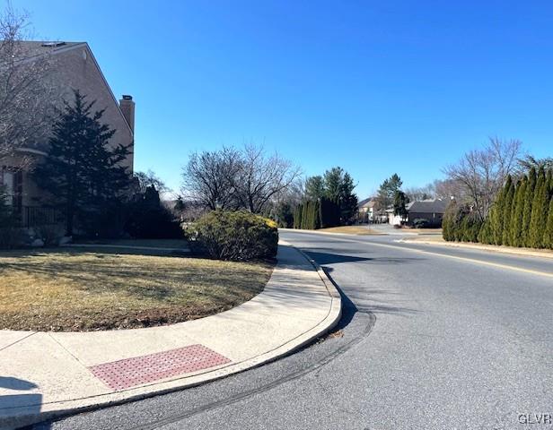 view of street with curbs and sidewalks