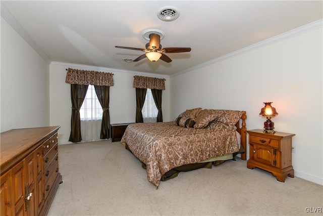 bedroom featuring visible vents, light colored carpet, ornamental molding, and a ceiling fan