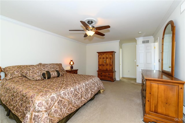 bedroom featuring visible vents, baseboards, ceiling fan, ornamental molding, and light carpet