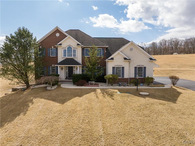 view of front of property featuring stucco siding