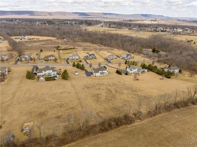 aerial view featuring a mountain view and a rural view