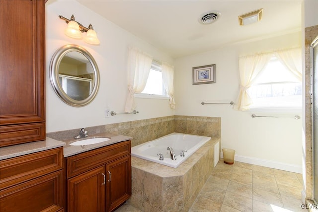 bathroom featuring an enclosed shower, visible vents, vanity, and a garden tub