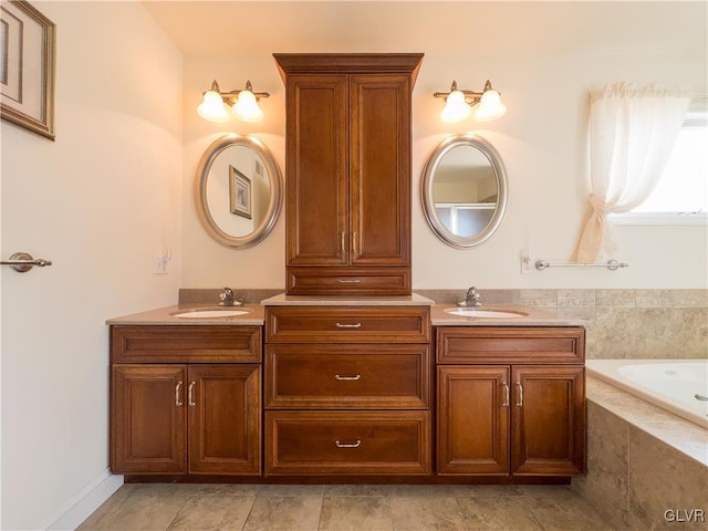 bathroom featuring double vanity, a relaxing tiled tub, and a sink