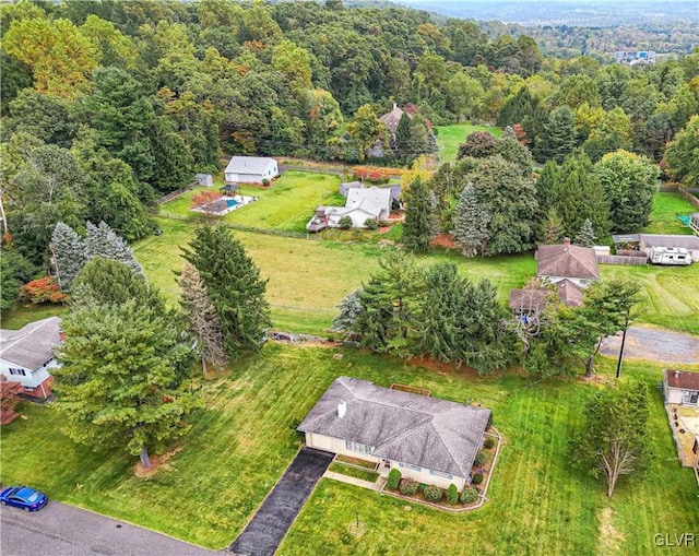 aerial view featuring a forest view