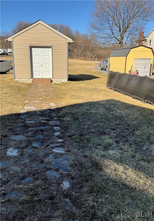 exterior space with a storage shed