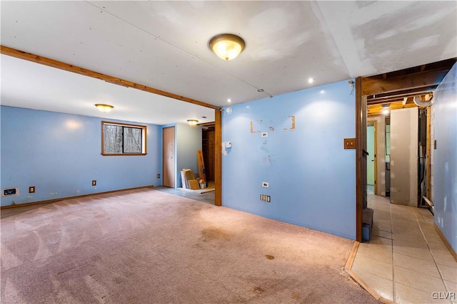 empty room featuring light colored carpet