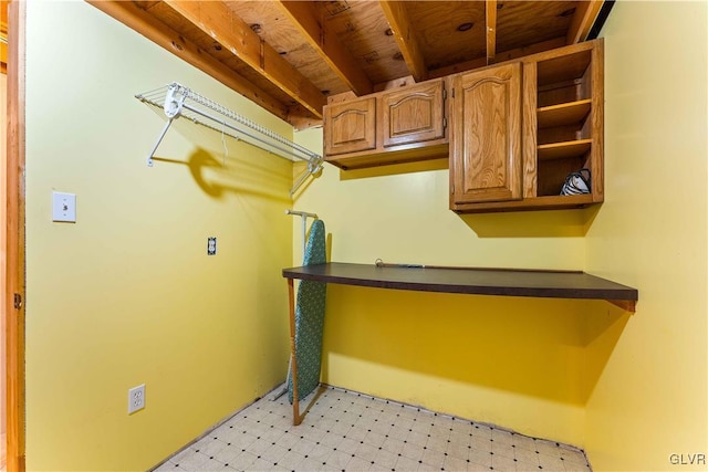 laundry area featuring light floors