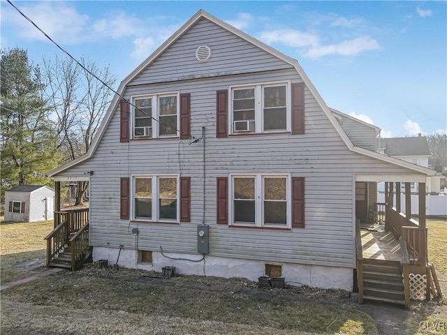 exterior space with a gambrel roof