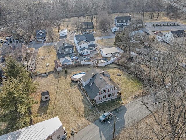 birds eye view of property with a residential view