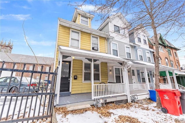 view of front of property featuring covered porch