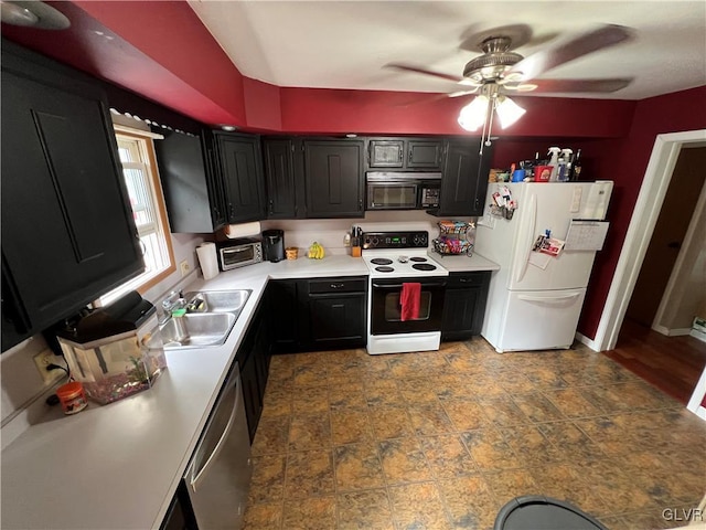 kitchen with freestanding refrigerator, a sink, range with electric cooktop, black microwave, and dishwasher