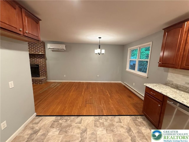 3965 Blacksmith Rd, Weisenberg Twp, PA 18066 - unfurnished dining area with a baseboard radiator, an AC wall unit, baseboards, a fireplace, and stone finish floors