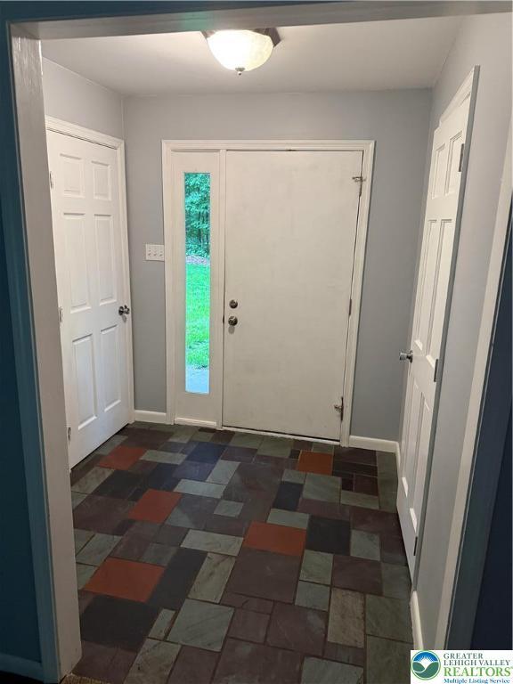 3965 Blacksmith Rd, Weisenberg Twp, PA 18066 - foyer entrance featuring baseboards