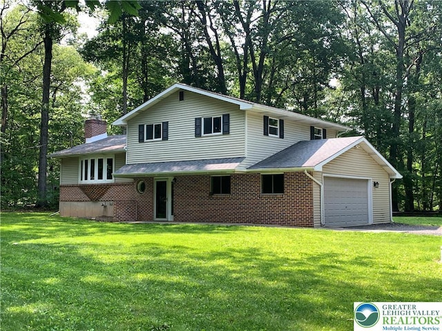 3965 Blacksmith Rd, Weisenberg Twp, PA 18066 - split level home with brick siding, a front lawn, and roof with shingles