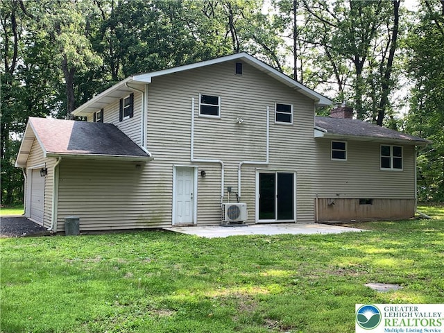 3965 Blacksmith Rd, Weisenberg Twp, PA 18066 - rear view of house with a cooling unit, a chimney, a lawn, and a shingled roof