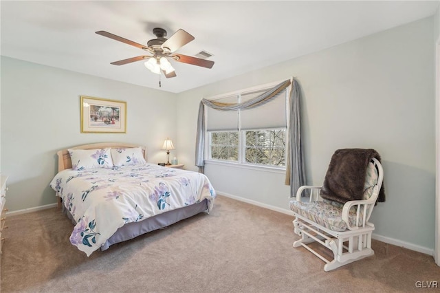 bedroom with visible vents, baseboards, and carpet