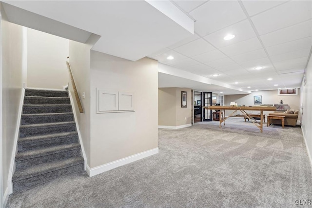 rec room with recessed lighting, baseboards, a paneled ceiling, and carpet