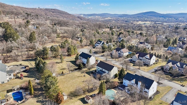 aerial view with a mountain view and a residential view