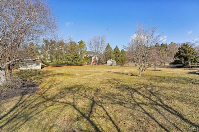 view of yard featuring fence