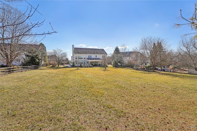 view of yard with fence