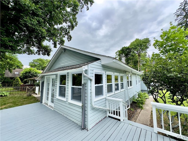 wooden deck featuring fence