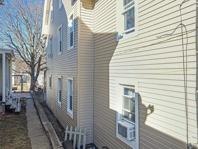 view of property exterior with cooling unit