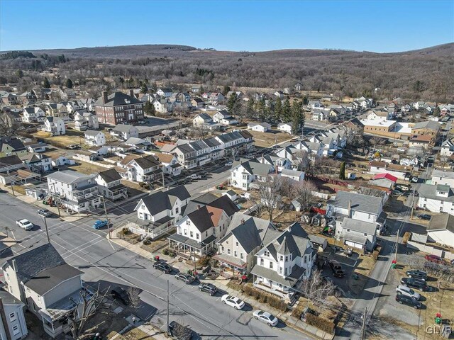 birds eye view of property with a residential view